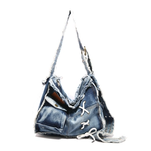 Retro washed denim shoulder bag with frayed edges and decorative white laces