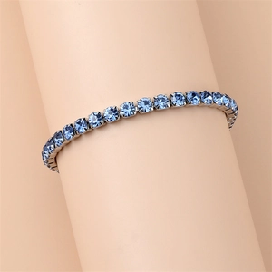 Close-up of blue square rhinestones claw chain bracelet with silver stainless steel base