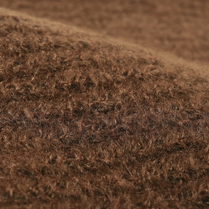 Deep brown thick knit wool beanie with plush texture for warm winter outdoor fashion wear