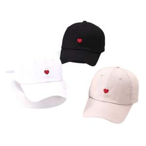 Minimalist cotton baseball caps with red heart embroidery in black, white, and beige colors