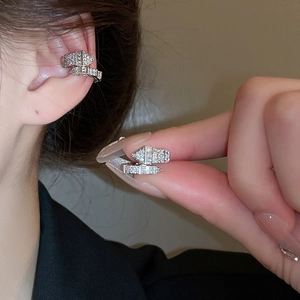 Silver snake-shaped ear cuff with sparkling zircon inlay for a luxury minimalist look
