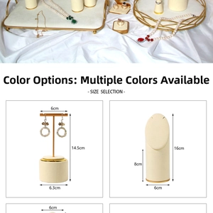 Detail view of beige velvet jewelry display stand set with gold metal base and dimensions