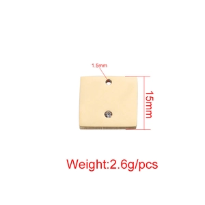 Polished square gold metal pendant with small crystal and specific size dimensions
