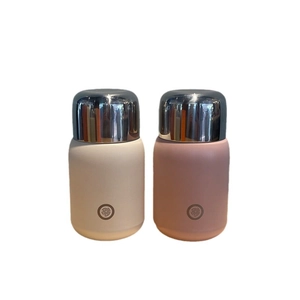 Insulated 316 stainless steel thermal water bottles in cream and nude pink colors