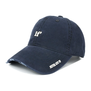 Detail of navy cotton baseball cap with if embroidery and distressed brim edge