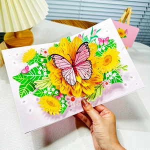 3D pop-up birthday card featuring a large yellow sunflower and pink butterfly design