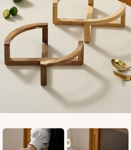 Detail of cross-shaped wooden base stand with natural grain texture for salad bowls