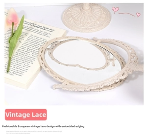 Close-up of European retro oval vanity mirror with intricate carved lace hollow edge