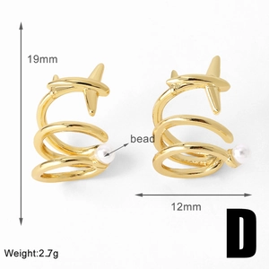 Detail view of 18k gold plated C-shaped earrings with plane motif and pearl charm