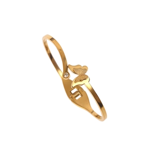 18k gold butterfly open bangle with matte finish wings and sparkling cubic zirconia