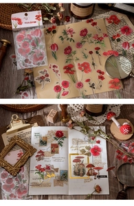 Detail of vintage PET floral stickers featuring red poppies and mushrooms for DIY journaling