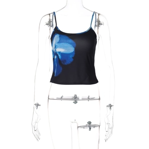 Detail of black crop camisole with blue floral print on transparent mannequin