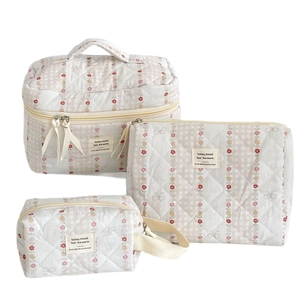 Beige floral quilted cotton cosmetic bag 3-piece set including handbag and pouches