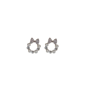 Elegant silver bow earrings with sparkling zircons and delicate white pearls round hoop