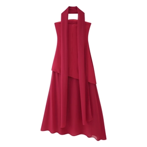 Detail of burgundy halter neck dress with lightweight layered chiffon and matching long scarf