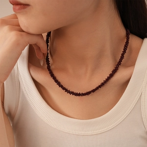 Retro deep red stone beaded necklace for women in minimalist ethnic style on model