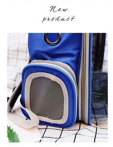 Macro detail of blue canvas pet carrier with breathable mesh window and zipper closure