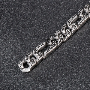 Detailed macro view of the vintage engraved steel links on this hip-hop trend necklace