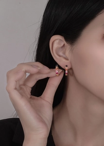 Close-up of model wearing 3mm rainbow zircon hoop earrings in gold-plated sterling silver