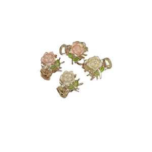 Floral mini hair clips set with pink roses, white camellias, and pearls for elegant hairstyles