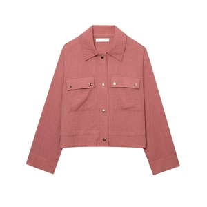 Detail of dusty rose short jacket with metal buttons and flap pockets on white background