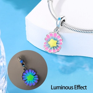 Detailed view of luminous colorful flower charm for snake chain bracelet with glow effect