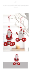 Detail of wooden Santa and Snowman ornaments with red wheels hanging on a white branch