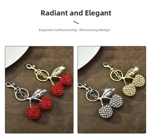 Detailed macro view of crystal rhinestone cherry keychains with polished lobster clasps