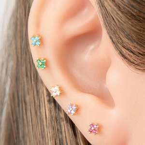 Set of five colorful zircon flower stud earrings in gold-plated stainless steel on ear