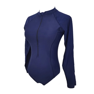 Front detail of long-sleeve surfing swimsuit with high collar and front zipper closure
