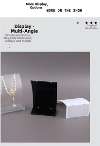 Detailed comparison of curved necklace display stands in black, white, and clear finishes