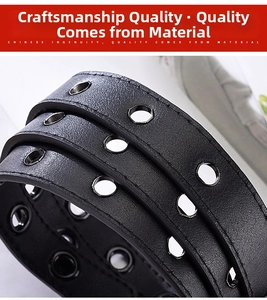 Detail of black leather punk belt with multiple rows of metallic eyelets and neat stitching