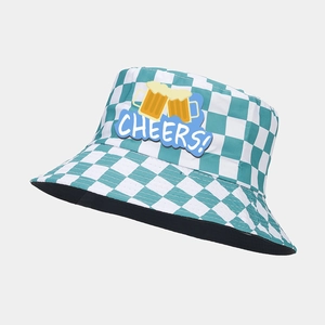 Detail of green checkered Oktoberfest bucket hat with Cheers and beer mugs embroidery