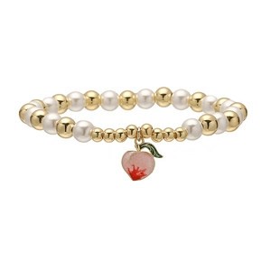 Sweet pink enamel peach charm bracelet with white pearls and gold beads on white background