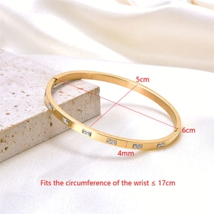Detailed view of rose gold plated stainless steel bracelet with rectangular zircon inlay
