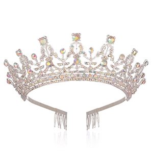 Detailed view of silver bridal crown with iridescent rhinestones and side combs
