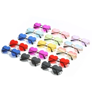 Frameless heart shaped sunglasses with unique lightning pattern and gradient metal trim