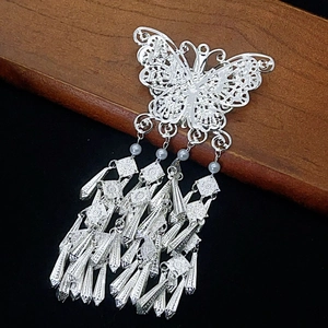 Ethnic silver butterfly hair clip with filigree wings and long tassel beaded drops
