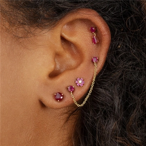 S925 silver gold-plated red ruby flower stud earrings set with diamonds on model