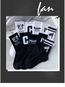 Close-up of cotton crew socks with graphic prints and Sketch Phantom lettering detail