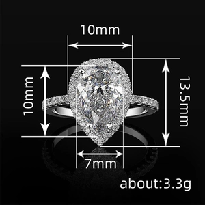Elegant pear cut cubic zirconia halo engagement ring for women in polished silver finish