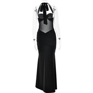 Detail of backless halter dress featuring sheer mesh panel and ruched fishtail design