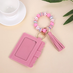 Pink silicone bead bracelet keychain with PU leather card holder and tassel charm