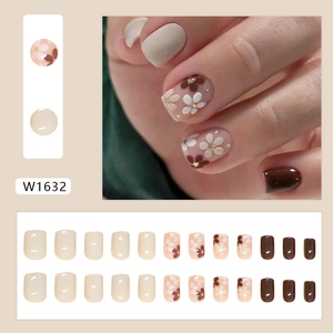 Floral press-on nails set in cream and dark brown tones with 24 multi-size square tips
