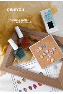 Artistic layout of 15ml dark green and reddish-brown watercolor nail ink set in packaging