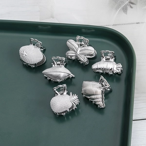 6-piece set of silver mini metal hair claws in shell, butterfly, and leaf shapes