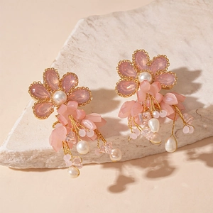 Pink resin flower tassel earrings with freshwater pearls and gold metal strands