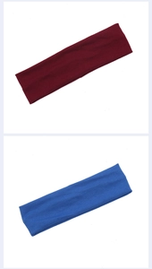 Detail of red and blue soft elastic sports headbands for yoga on white background
