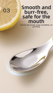 Macro view of mirror polished 316L stainless steel baby spoon head with smooth edges