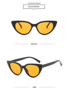 Detailed views of vintage cat-eye sunglasses with black frames and orange lenses